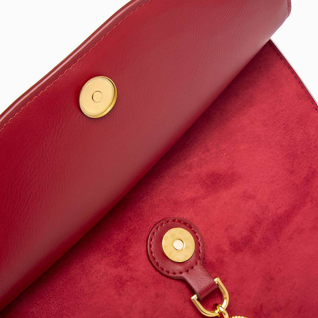 Regal Charm Suede Handbag